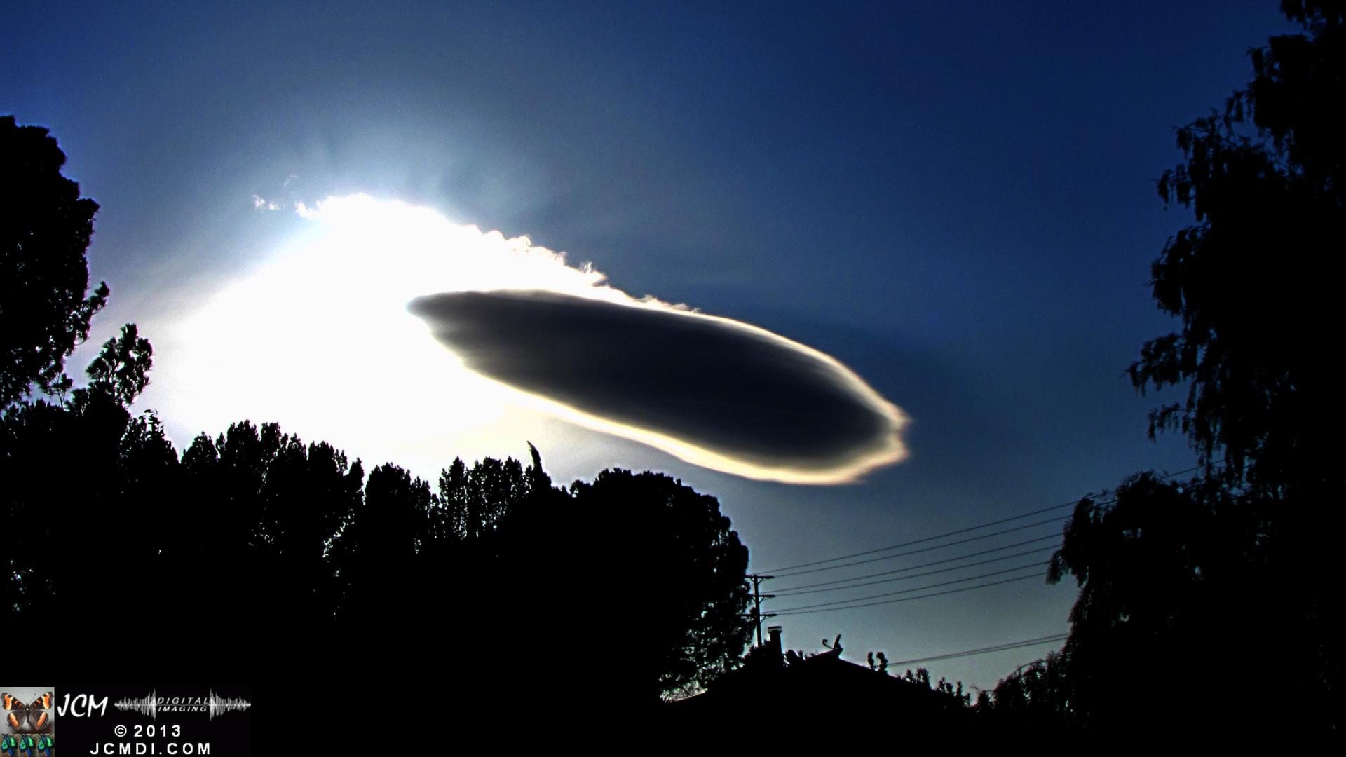 3-9-2010 Spectacular UFO lenticular Cloud and sunset stills with rainbow ice crystals